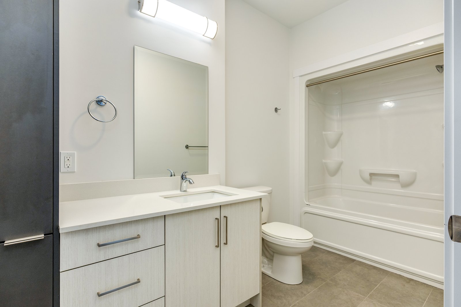Bathroom with a tub-and-shower combo